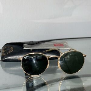 Ray Ban Gold round sunglasses with black lenses #sunglasses